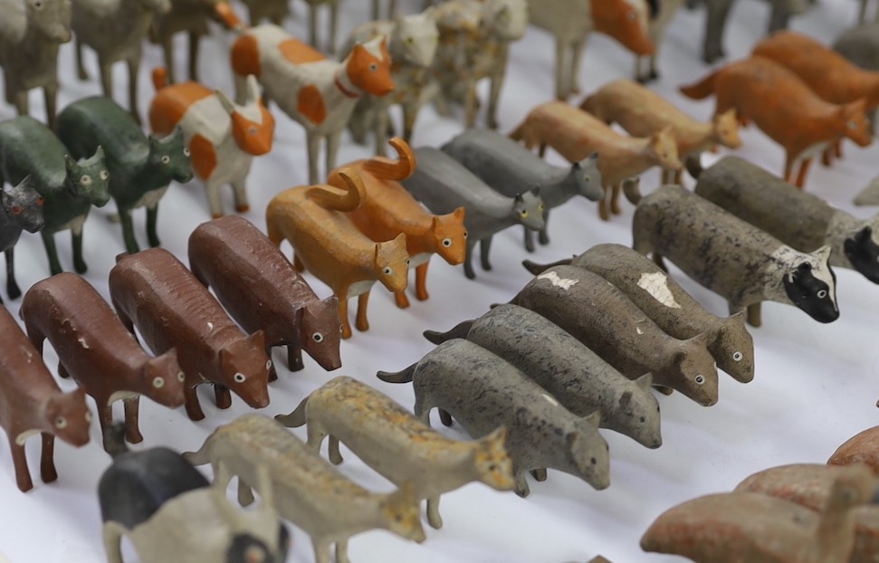 A late 19th century German painted wood Noah's Ark with 136 assorted figures and animals, 14cm wide, 54cm long, 30cm high, largest figure 8cm